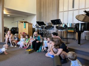 Children participate in "Children's Time" with Pastor Laura during worship